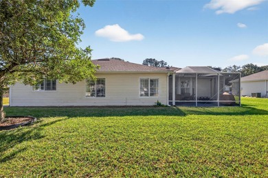 Well-maintained and updated Extended Palm II model in Del Webb on Eagle Ridge At Spruce Creek Country Club in Florida - for sale on GolfHomes.com, golf home, golf lot