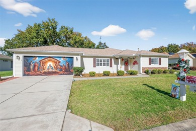 Well-maintained and updated Extended Palm II model in Del Webb on Eagle Ridge At Spruce Creek Country Club in Florida - for sale on GolfHomes.com, golf home, golf lot