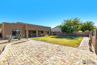 Beautiful custom Santa Fe style home on the golf course in Mesa on Mesa Del Sol Golf Club in Arizona - for sale on GolfHomes.com, golf home, golf lot