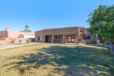 Beautiful custom Santa Fe style home on the golf course in Mesa on Mesa Del Sol Golf Club in Arizona - for sale on GolfHomes.com, golf home, golf lot