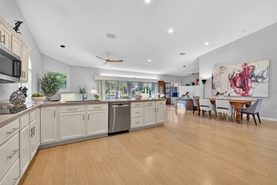 Uniquely settled in serene GOLF COURSE living and just minutes on Pasadena Yacht and Country Club in Florida - for sale on GolfHomes.com, golf home, golf lot