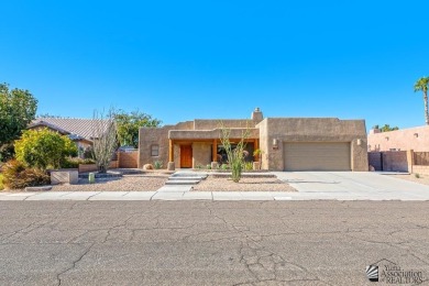 Beautiful custom Santa Fe style home on the golf course in Mesa on Mesa Del Sol Golf Club in Arizona - for sale on GolfHomes.com, golf home, golf lot