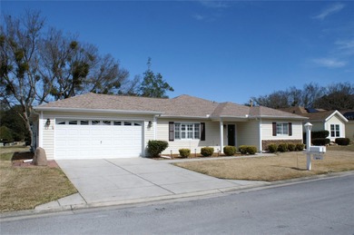 Well-maintained and updated Extended Palm II model in Del Webb on Eagle Ridge At Spruce Creek Country Club in Florida - for sale on GolfHomes.com, golf home, golf lot