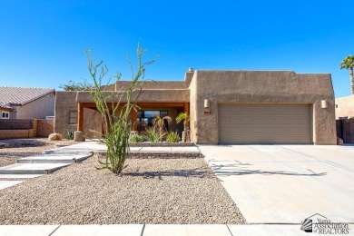 Beautiful custom Santa Fe style home on the golf course in Mesa on Mesa Del Sol Golf Club in Arizona - for sale on GolfHomes.com, golf home, golf lot