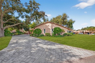 Uniquely settled in serene GOLF COURSE living and just minutes on Pasadena Yacht and Country Club in Florida - for sale on GolfHomes.com, golf home, golf lot