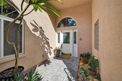 Uniquely settled in serene GOLF COURSE living and just minutes on Pasadena Yacht and Country Club in Florida - for sale on GolfHomes.com, golf home, golf lot