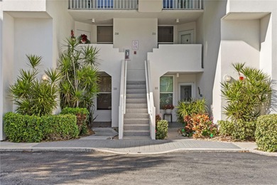 Welcome home to paradise at Isla Key, a coveted waterfront on Isla Del Sol Yacht and Country Club in Florida - for sale on GolfHomes.com, golf home, golf lot