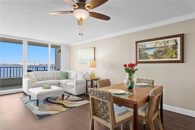 Welcome home to paradise at Isla Key, a coveted waterfront on Isla Del Sol Yacht and Country Club in Florida - for sale on GolfHomes.com, golf home, golf lot