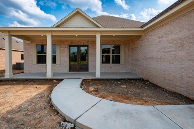 Beautiful all-brick new construction home on a level lot in the on The Country Club of Arkansas in Arkansas - for sale on GolfHomes.com, golf home, golf lot