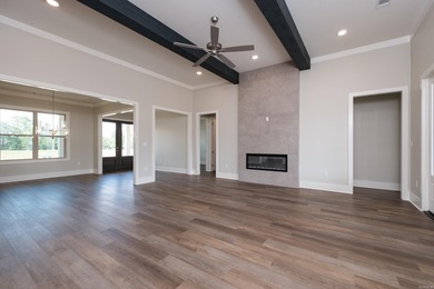 Beautiful all-brick new construction home on a level lot in the on The Country Club of Arkansas in Arkansas - for sale on GolfHomes.com, golf home, golf lot