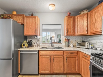 Welcome to this charming 2-bedroom, 2-bathroom ranch-style home on Oakleigh Executive Golf Course in Florida - for sale on GolfHomes.com, golf home, golf lot