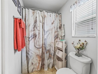 Welcome to this charming 2-bedroom, 2-bathroom ranch-style home on Oakleigh Executive Golf Course in Florida - for sale on GolfHomes.com, golf home, golf lot
