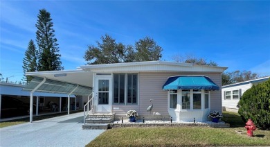 This beautifully updated 2-bedroom, 2-bathroom home is located on Fairway Village Golf Course in Florida - for sale on GolfHomes.com, golf home, golf lot