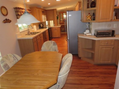 This move in ready 1605 sf split 3/2 home is offered for $169 on Crane Lakes Golf and Country Club in Florida - for sale on GolfHomes.com, golf home, golf lot