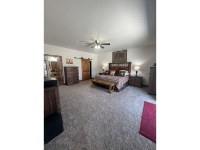 Listed by Lonnie Doney, KWBH, . Nestled in Boulder Falls on Southern Hills Golf Course in South Dakota - for sale on GolfHomes.com, golf home, golf lot