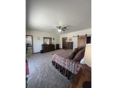 Listed by Lonnie Doney, KWBH, . Nestled in Boulder Falls on Southern Hills Golf Course in South Dakota - for sale on GolfHomes.com, golf home, golf lot