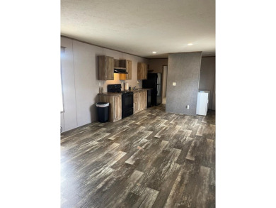 Discover this inviting 3-bedroom, 2-bathroom split-floorplan on Rockport Country Club in Texas - for sale on GolfHomes.com, golf home, golf lot