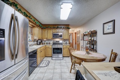 Impeccably Maintained Ranch on a  1/2 -Acre Lot and located on Baxter Country Club in Kansas - for sale on GolfHomes.com, golf home, golf lot