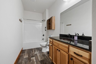 Listed by Lonnie Doney, KWBH, . Nestled in Boulder Falls on Southern Hills Golf Course in South Dakota - for sale on GolfHomes.com, golf home, golf lot