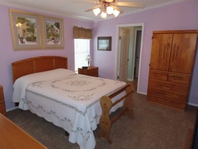 This move in ready 1605 sf split 3/2 home is offered for $169 on Crane Lakes Golf and Country Club in Florida - for sale on GolfHomes.com, golf home, golf lot