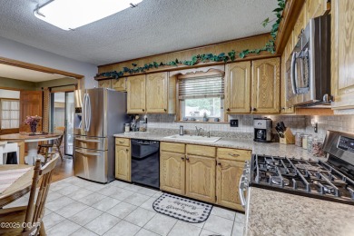 Impeccably Maintained Ranch on a  1/2 -Acre Lot and located on Baxter Country Club in Kansas - for sale on GolfHomes.com, golf home, golf lot