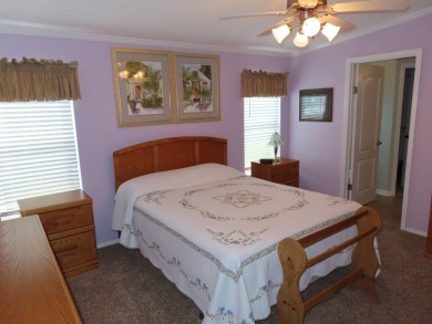 This move in ready 1605 sf split 3/2 home is offered for $169 on Crane Lakes Golf and Country Club in Florida - for sale on GolfHomes.com, golf home, golf lot