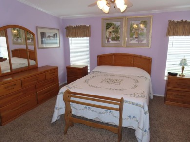 This move in ready 1605 sf split 3/2 home is offered for $169 on Crane Lakes Golf and Country Club in Florida - for sale on GolfHomes.com, golf home, golf lot