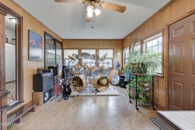 Impeccably Maintained Ranch on a  1/2 -Acre Lot and located on Baxter Country Club in Kansas - for sale on GolfHomes.com, golf home, golf lot