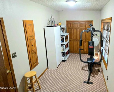Impeccably Maintained Ranch on a  1/2 -Acre Lot and located on Baxter Country Club in Kansas - for sale on GolfHomes.com, golf home, golf lot
