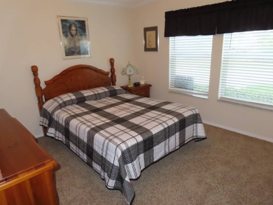 This move in ready 1605 sf split 3/2 home is offered for $169 on Crane Lakes Golf and Country Club in Florida - for sale on GolfHomes.com, golf home, golf lot