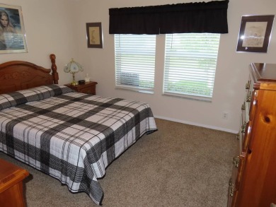This move in ready 1605 sf split 3/2 home is offered for $169 on Crane Lakes Golf and Country Club in Florida - for sale on GolfHomes.com, golf home, golf lot
