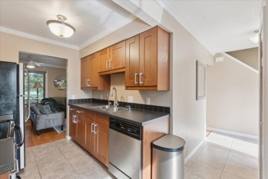 Don't miss out on this updated 3 bed 1 1/2 bath end unit condo on Lake O The Hills Golf Course in Michigan - for sale on GolfHomes.com, golf home, golf lot