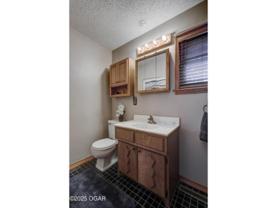 Impeccably Maintained Ranch on a  1/2 -Acre Lot and located on Baxter Country Club in Kansas - for sale on GolfHomes.com, golf home, golf lot