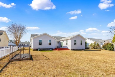 Discover coastal charm with this ranch-style home in the serene on Indigo Creek Golf Club in South Carolina - for sale on GolfHomes.com, golf home, golf lot