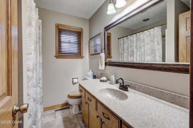 Impeccably Maintained Ranch on a  1/2 -Acre Lot and located on Baxter Country Club in Kansas - for sale on GolfHomes.com, golf home, golf lot