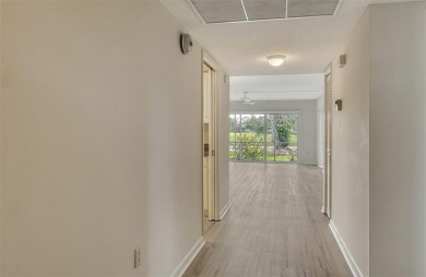One or more photo(s) has been virtually staged. Rarely available on Palm Aire Country Club of Sarasota in Florida - for sale on GolfHomes.com, golf home, golf lot