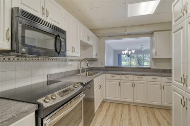 One or more photo(s) has been virtually staged. Rarely available on Palm Aire Country Club of Sarasota in Florida - for sale on GolfHomes.com, golf home, golf lot