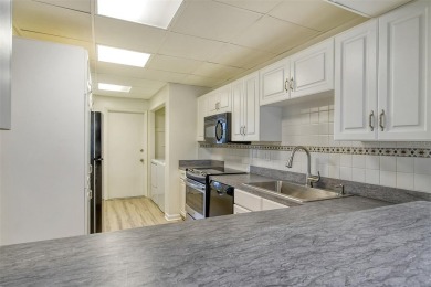 One or more photo(s) has been virtually staged. Rarely available on Palm Aire Country Club of Sarasota in Florida - for sale on GolfHomes.com, golf home, golf lot