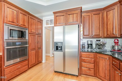 LUXURY FRENCH COTTAGE IN STONE BROOK AT GOVERNORS CLUB: on Governors Club in North Carolina - for sale on GolfHomes.com, golf home, golf lot