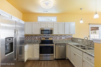 Enjoy life indoors & outdoors in this turnkey 4 bedroom 2 1/2 on The Lakes Country Club in North Carolina - for sale on GolfHomes.com, golf home, golf lot