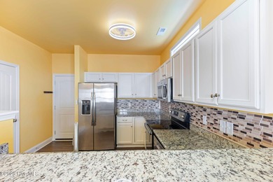 Enjoy life indoors & outdoors in this turnkey 4 bedroom 2 1/2 on The Lakes Country Club in North Carolina - for sale on GolfHomes.com, golf home, golf lot