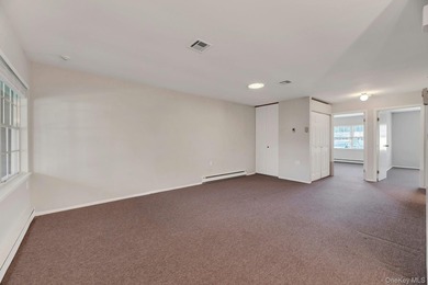 Move right into this beautifully maintained two-bedroom on Leisure Village Golf Course in New York - for sale on GolfHomes.com, golf home, golf lot