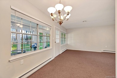 Move right into this beautifully maintained two-bedroom on Leisure Village Golf Course in New York - for sale on GolfHomes.com, golf home, golf lot