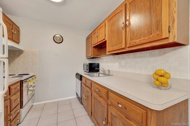 Move right into this beautifully maintained two-bedroom on Leisure Village Golf Course in New York - for sale on GolfHomes.com, golf home, golf lot