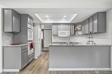 Nestled in the prestigious Ranch Country Club golf community on The Ranch Country Club in Colorado - for sale on GolfHomes.com, golf home, golf lot