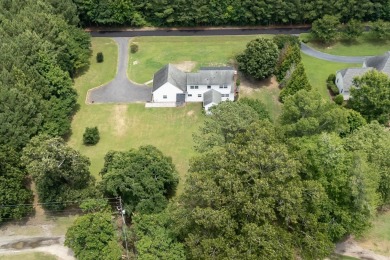 This 3 bedroom 2 bath home sits on almost one acre with peaceful on Eastern Shore Yacht and Country Club in Virginia - for sale on GolfHomes.com, golf home, golf lot