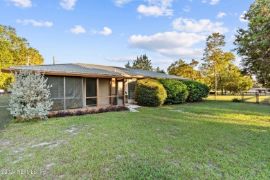 Welcome to this charming two-bedroom, one-bath home overlooking on Keystone Heights Golf and Country Club in Florida - for sale on GolfHomes.com, golf home, golf lot