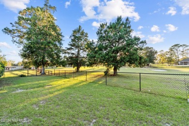 Welcome to this charming two-bedroom, one-bath home overlooking on Keystone Heights Golf and Country Club in Florida - for sale on GolfHomes.com, golf home, golf lot