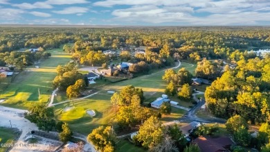 Welcome to this charming two-bedroom, one-bath home overlooking on Keystone Heights Golf and Country Club in Florida - for sale on GolfHomes.com, golf home, golf lot