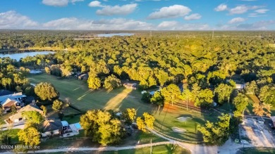 Welcome to this charming two-bedroom, one-bath home overlooking on Keystone Heights Golf and Country Club in Florida - for sale on GolfHomes.com, golf home, golf lot